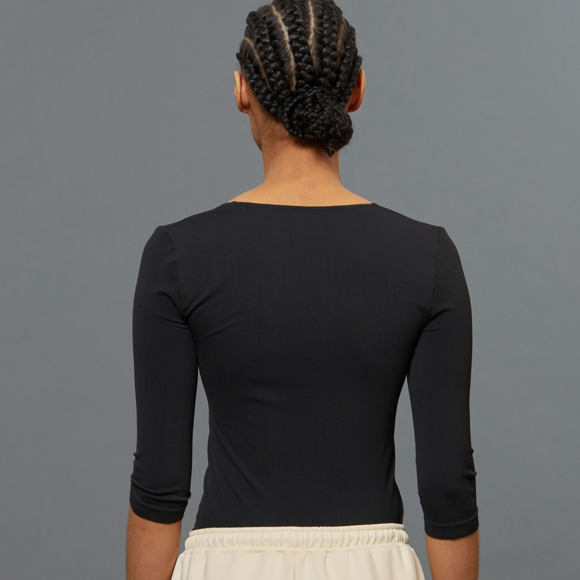 Black BeGood ¾ sleeve shaping top, a stylish beauty clothing piece with fitted design and comfortable fabric.