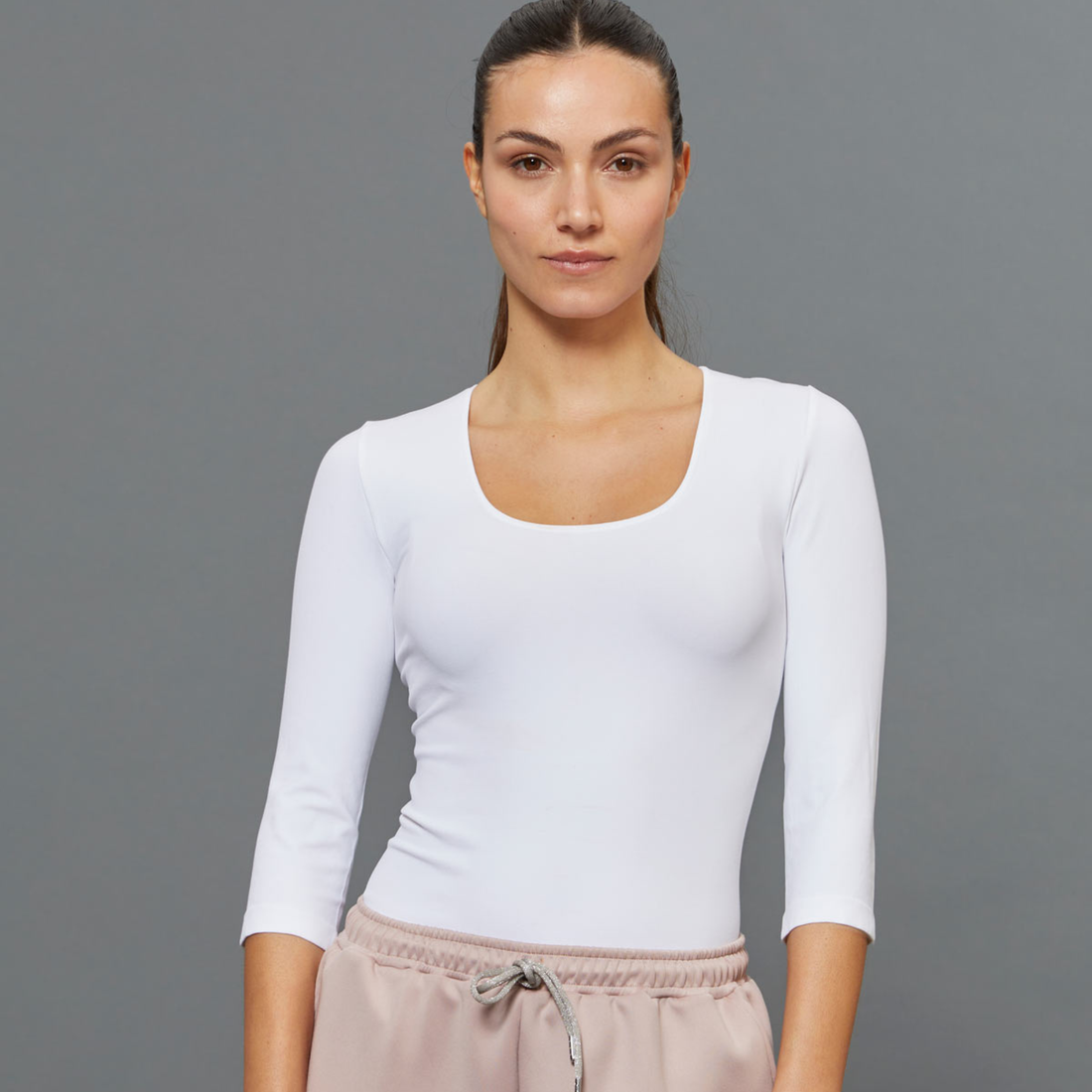 BeGood ¾ sleeve shaping top in black, showcasing its fitted design and smooth fabric for a sleek, flattering look.