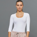 White BeGood ¾ sleeve shaping top, a stylish beauty clothing piece with comfortable fit and flattering silhouette.