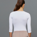 White BeGood ¾ sleeve shaping top, a stylish beauty clothing piece with comfortable fit and flattering design.