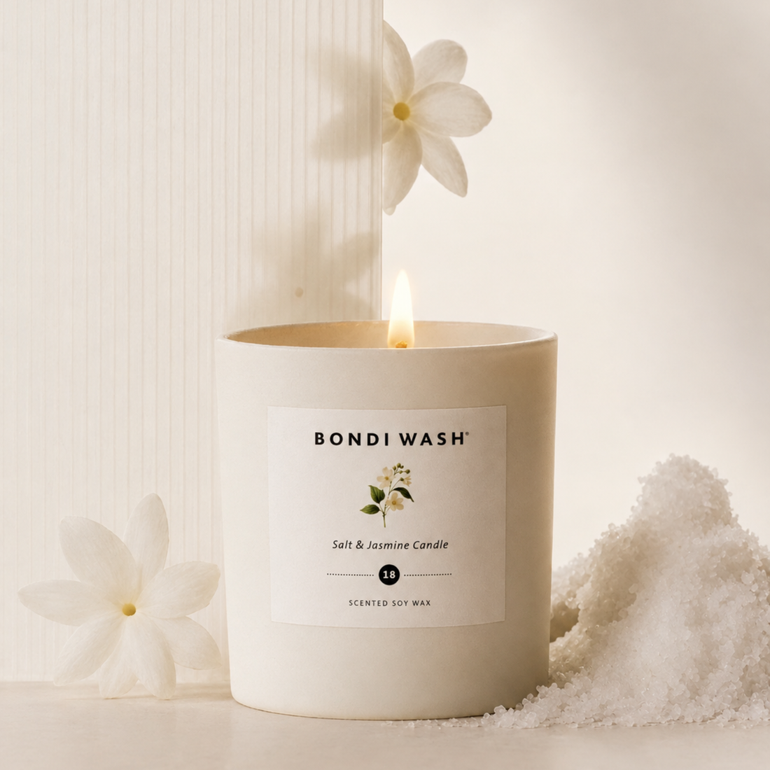 Bondi Wash scented soy wax candle with salt jasmine fragrance, featuring a sleek jar and natural candle wick.