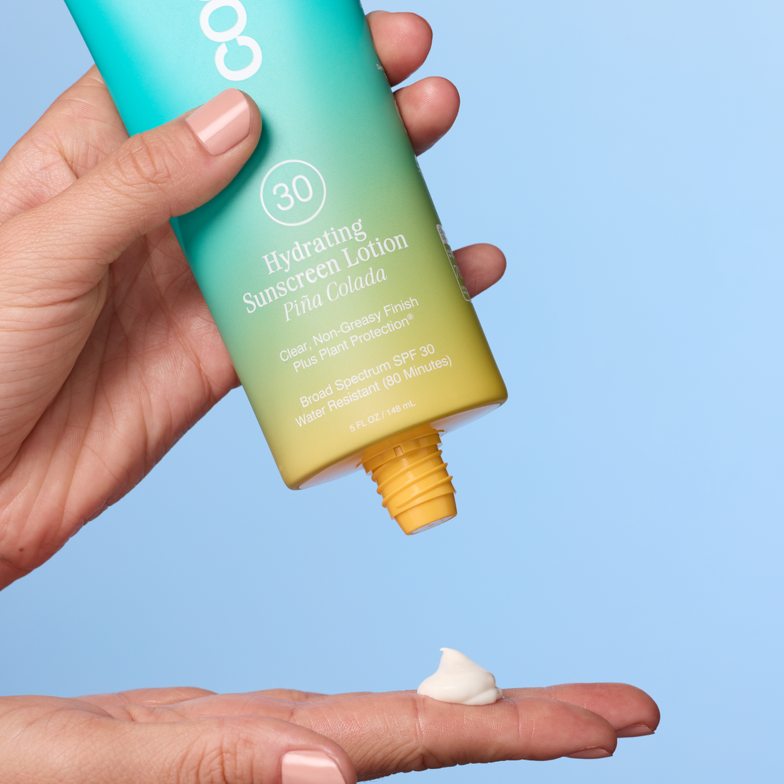 Coola Hydrating Sunscreen Lotion SPF30 with Pina Colada scent, featuring a white bottle and clear labeling, on a white background.