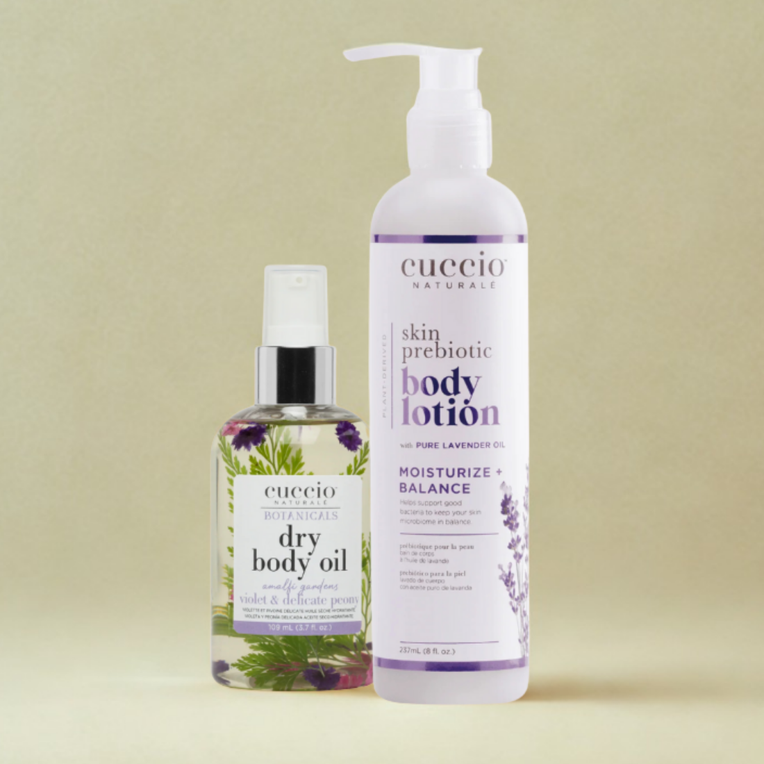 Two bottles of Cuccio Naturals body products on a beige background