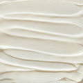 Close-up of Glory Cream smooth, beige cream texture 