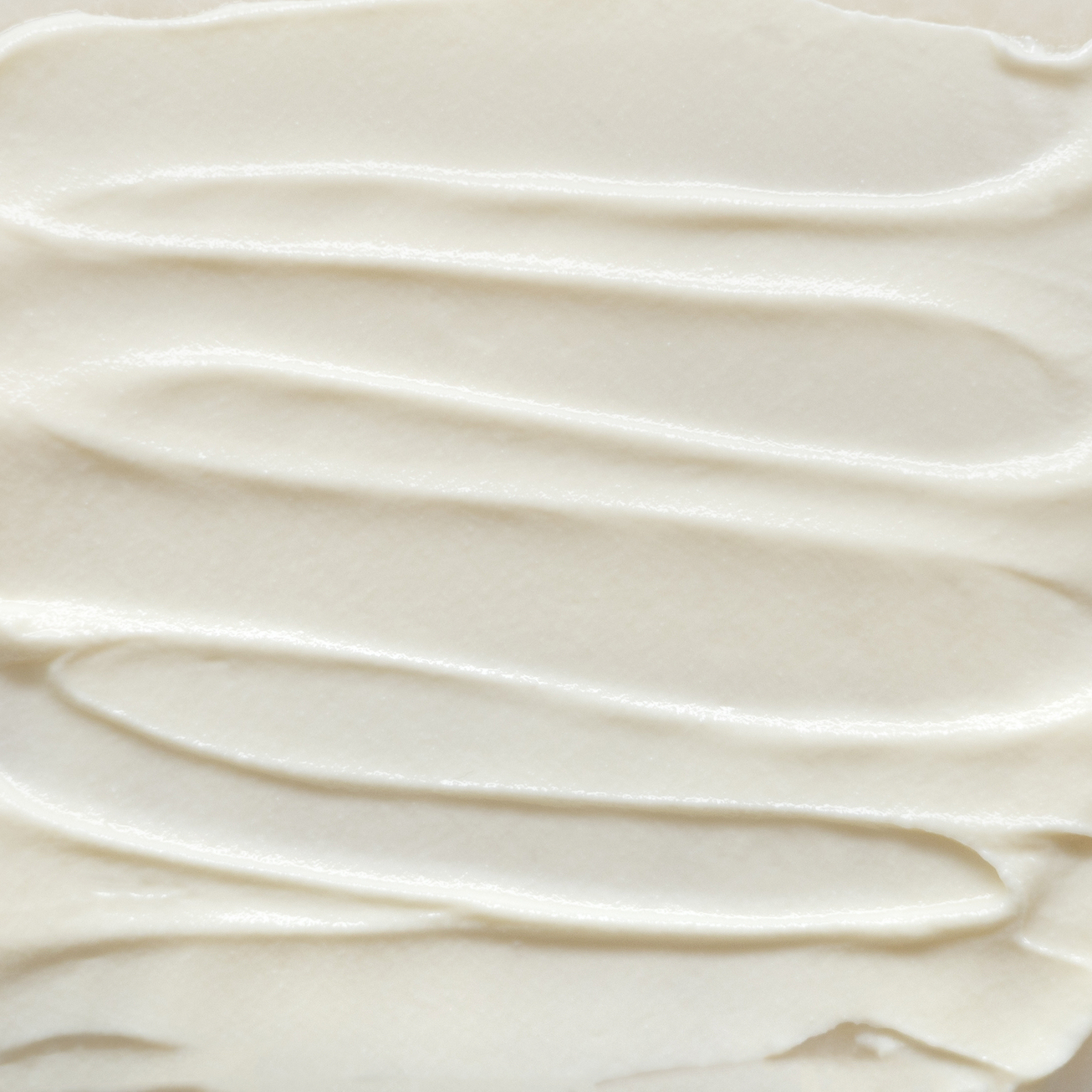 Close-up of Glory Cream smooth, beige cream texture 