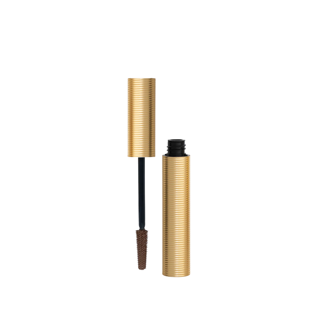 A gold ribbed Eco by Sonya Brown Mascara tube shown open with the wand removed, revealing a black applicator wand with a brown bristle tip, on a plain white background.