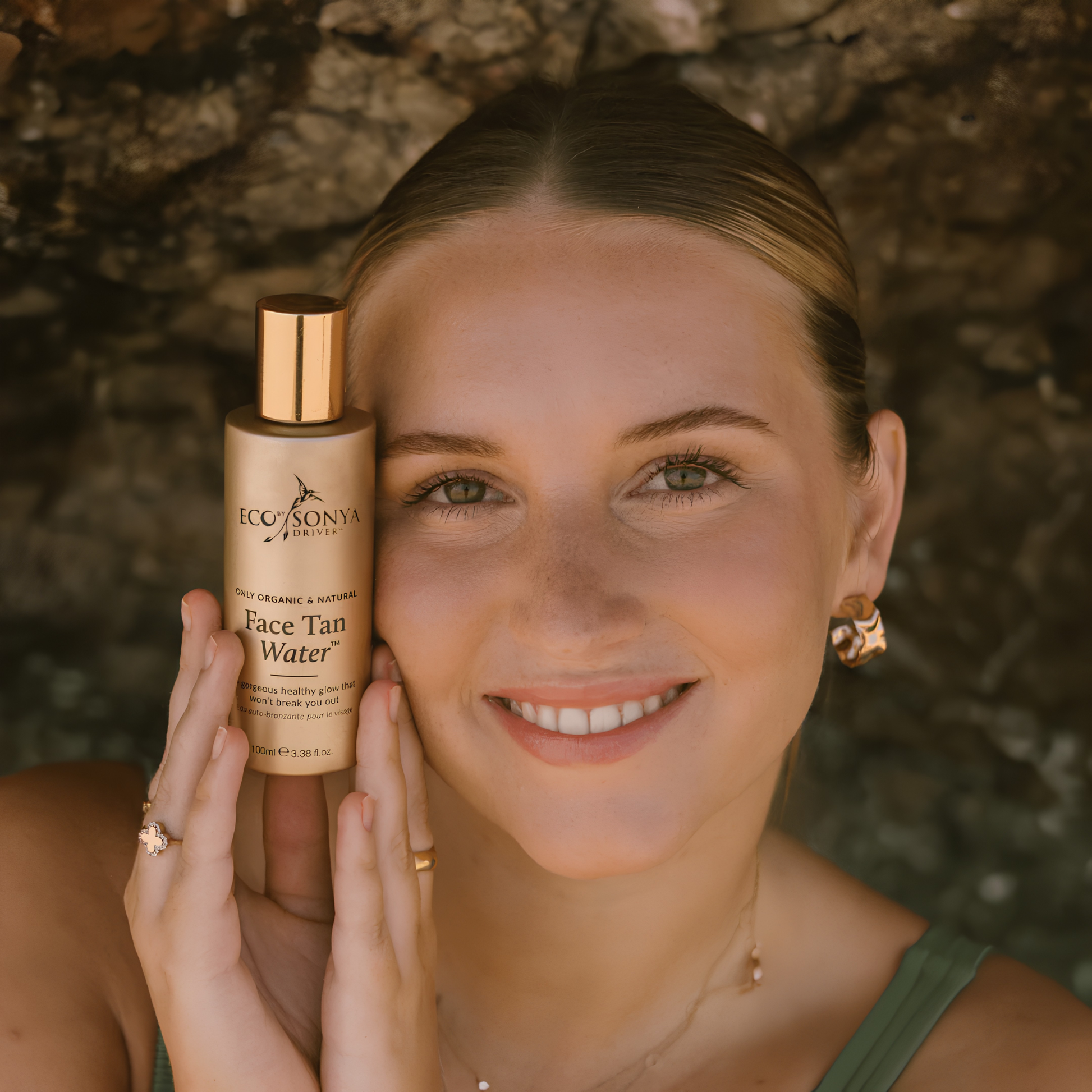 Eco by Sonya Driver Face Tan Water bottle showing the self tanner with a clear label and a pump dispenser.