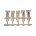 Five small cosmetic tubes in a clear plastic holder, labeled Anti-Age Collagen Serum by IS Clinical Skincare, on a plain white background.
