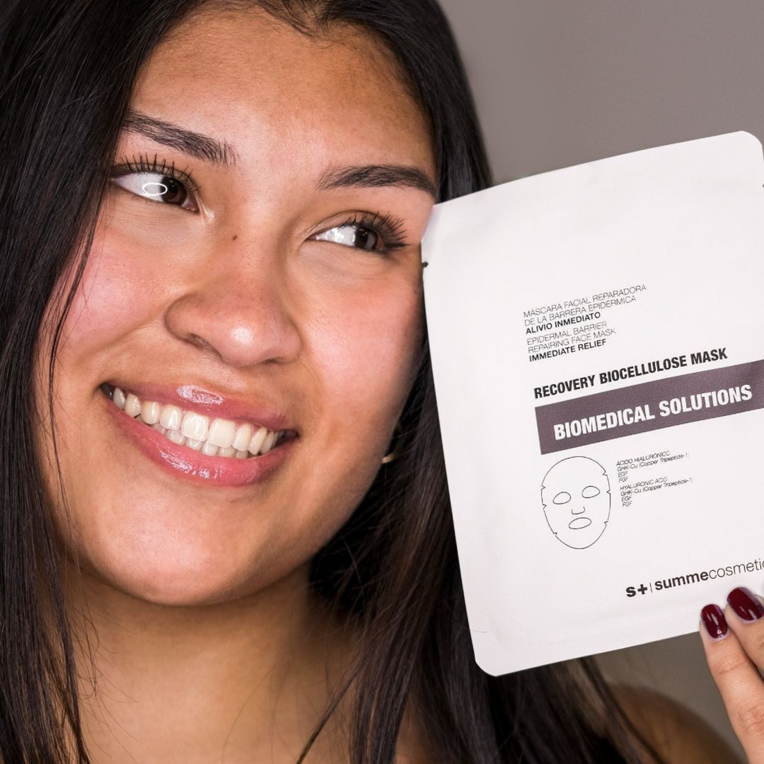 White face mask sheet with packaging labeled 'Summe Cosmetics' on a white background