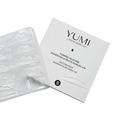 Yumi Lashes & Brows adhesive pads packaging and clear silicone adhesive pad tray on a white background, labeled size S.