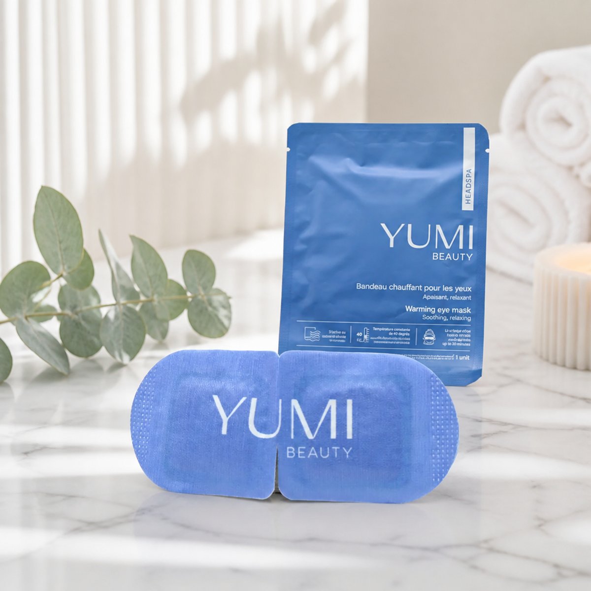 Yumi Beauty warming eye mask from Yumi Skincare, soft fabric with gentle heating for relaxing skincare treatment.