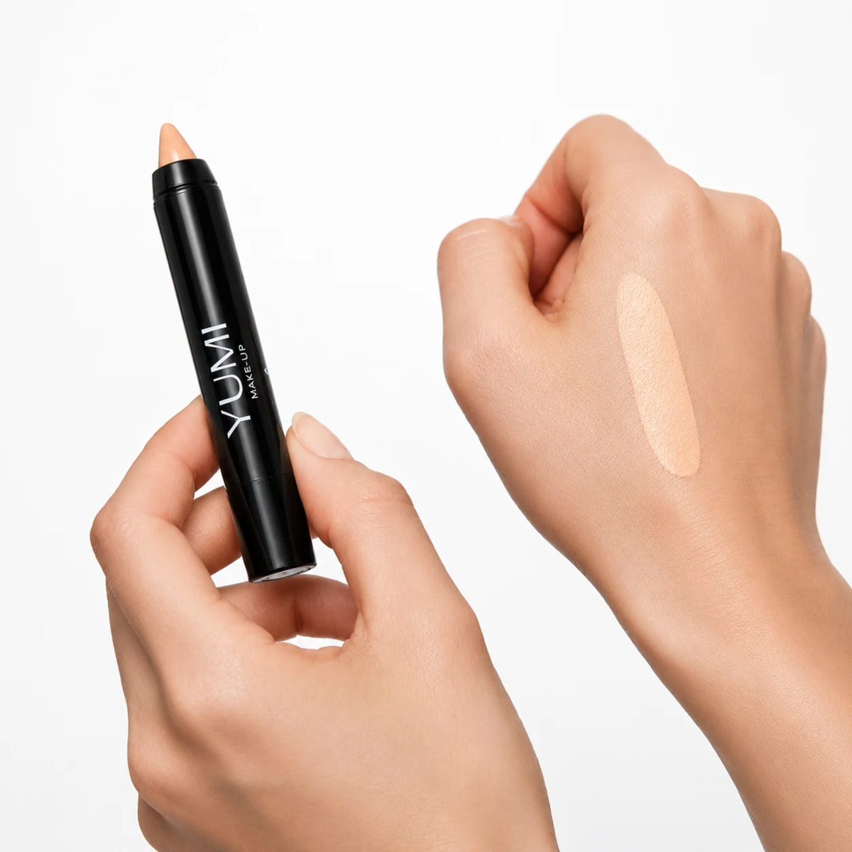 Yumi Beauty Makeup Concealer Stick in Medium Beige shade, angled view of the cosmetic tube and cap