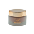 YUMI skincare cream jar with gold lid on a white background