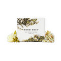 Bondi Wash Hair & Body Natural Care Kit with bottle of body wash and hair care products in a natural setting.
