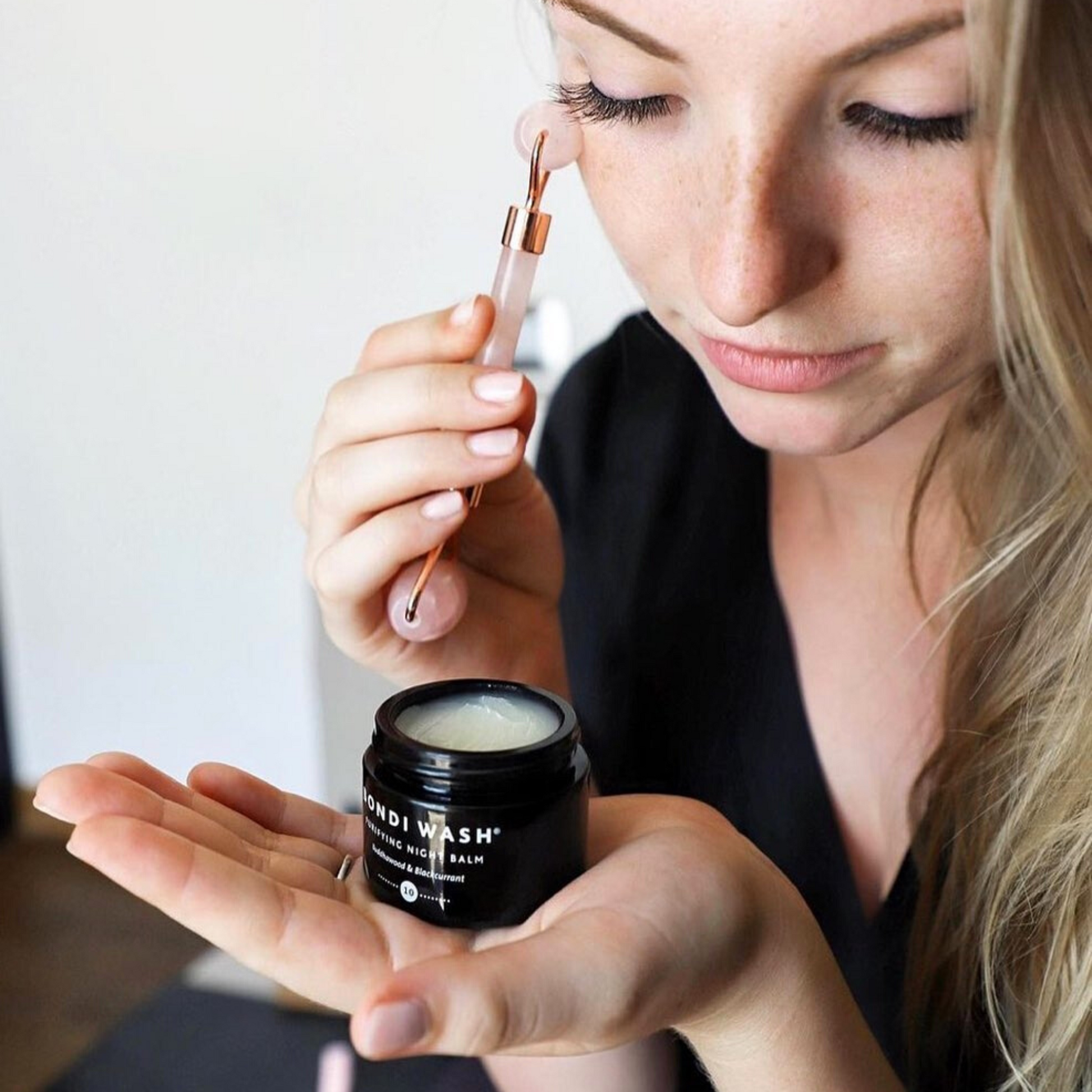 Bondi Wash Purifying Night Balm for anti-aging, shown in a sleek jar with a smooth, creamy texture suitable for nighttime skincare.