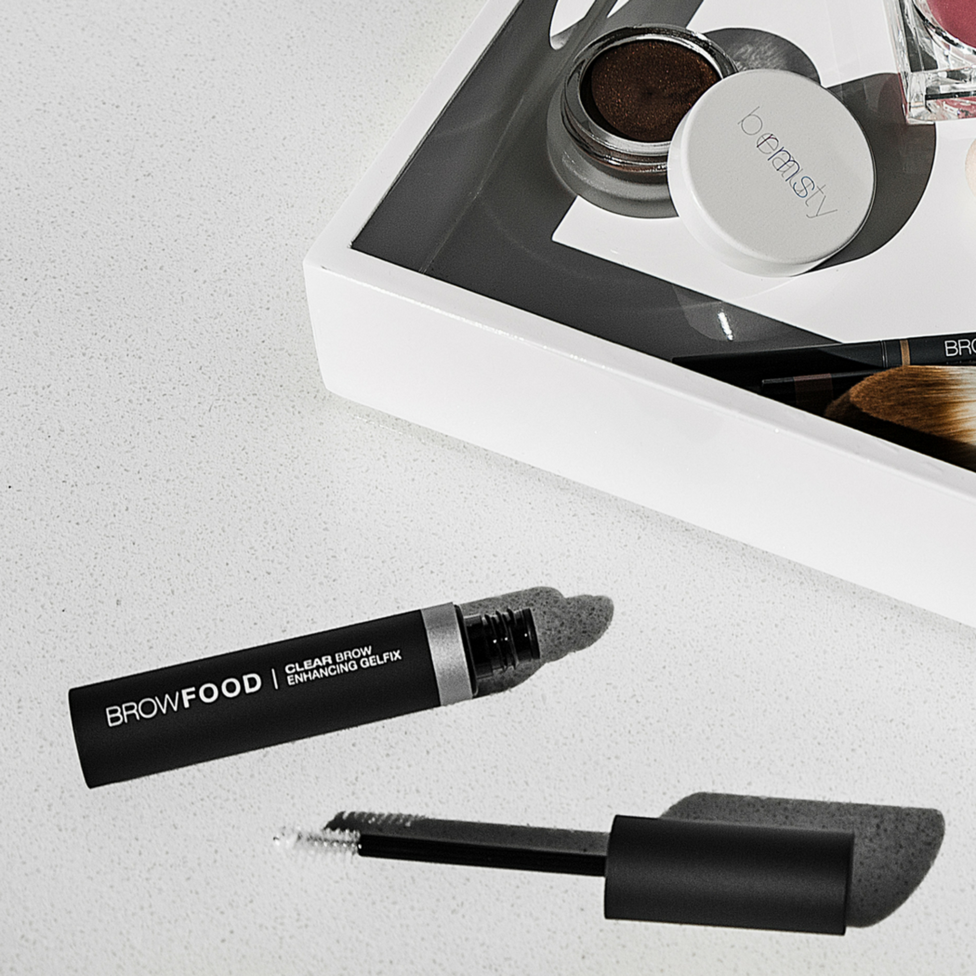 Clear brow gel from JB Cosmetics Browfood Enhancing Gelfix, shown in an 8ml tube, perfect for shaping and defining brows and lashes.