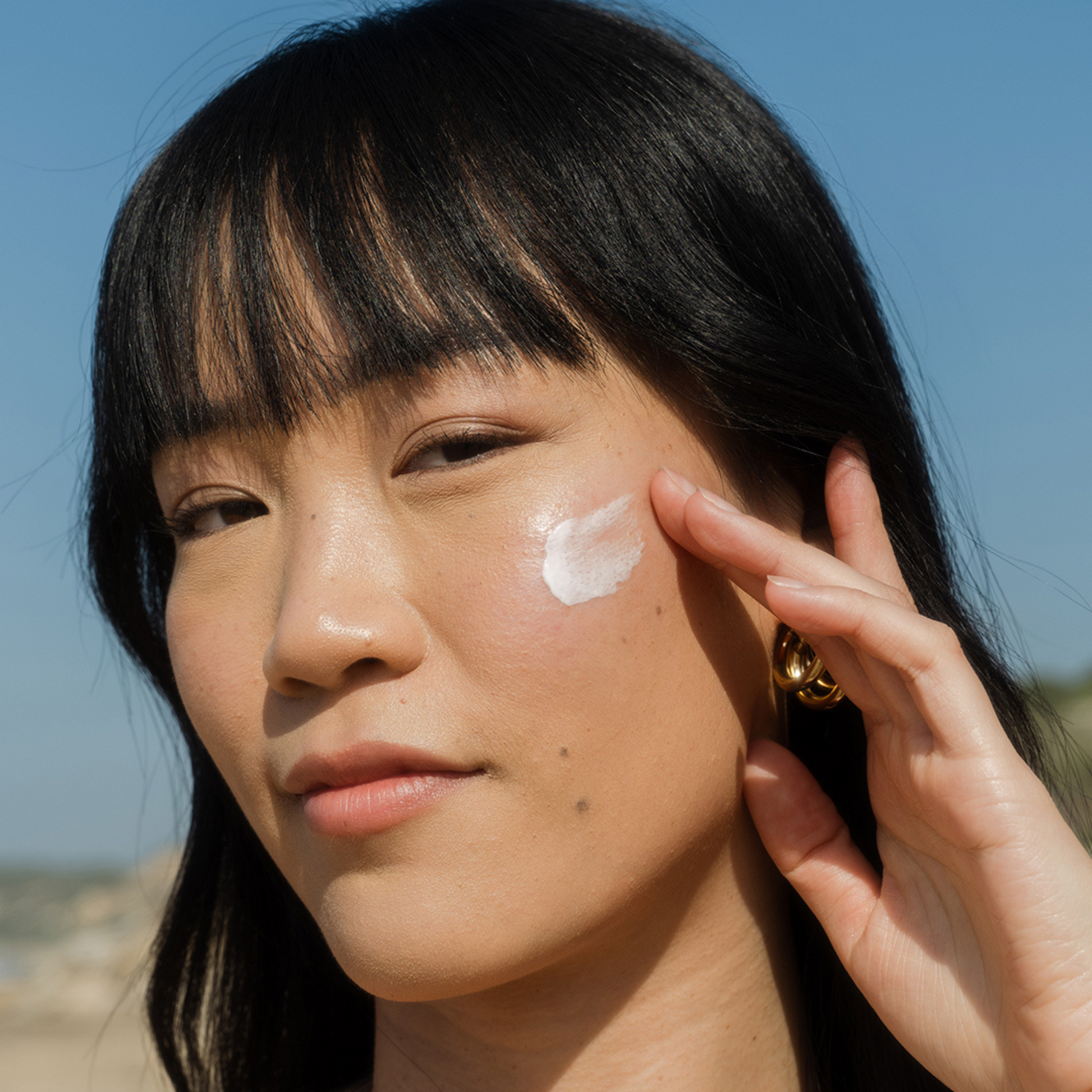 Coola Classic Face Organic Sunscreen Lotion SPF30 with cucumber scent, featuring a pump bottle and light, hydrating formula.