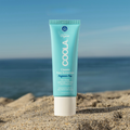 Coola Classic Face Organic Sunscreen Lotion SPF50, fragrance-free, in a white tube with a blue cap, suitable for daily skincare.