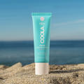 Coola Classic Face Organic Sunscreen Lotion SPF50 with White Tea, a lightweight facial sunscreen in white bottle.