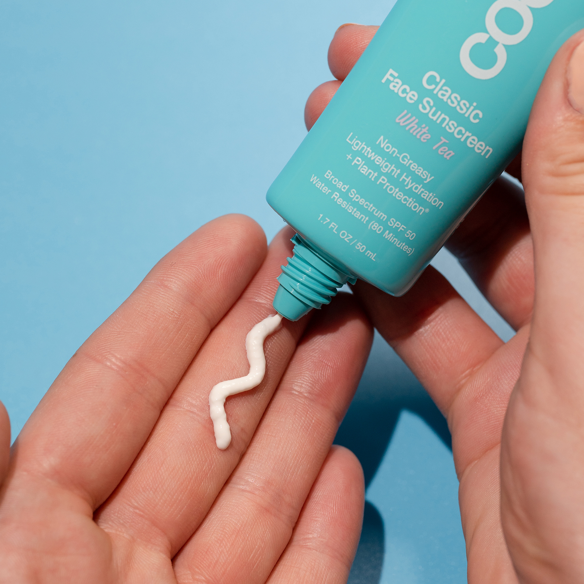 Coola Classic Face Organic Sunscreen Lotion SPF50 with White Tea, lightweight sunscreen for facial skin protection.