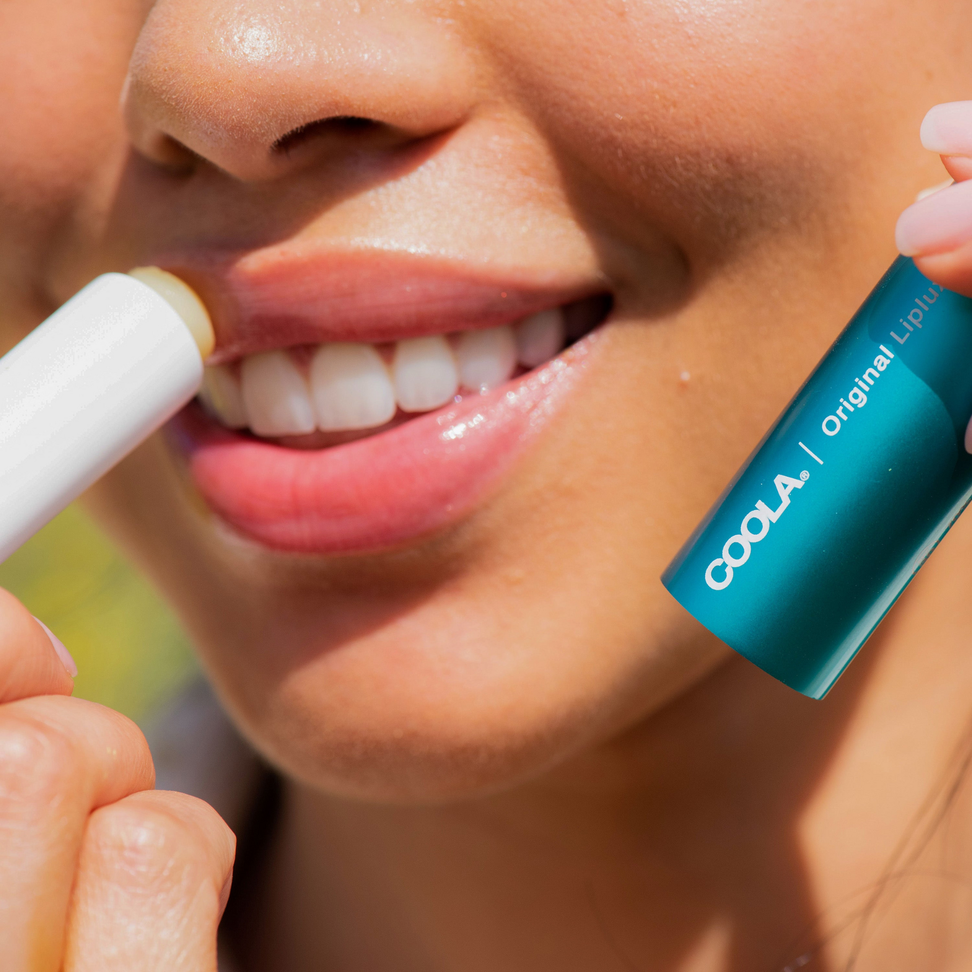 Coola Classic Liplux Organic Lip Balm with SPF 30, original formula, featuring a soothing, natural lip moisturizer and sunscreen.