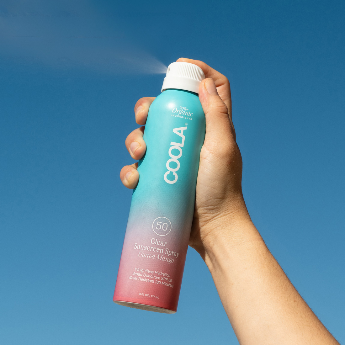 Coola Clear Sunscreen Spray SPF50 with Guava Mango scent, lightweight sun protection in an easy-to-apply spray bottle.