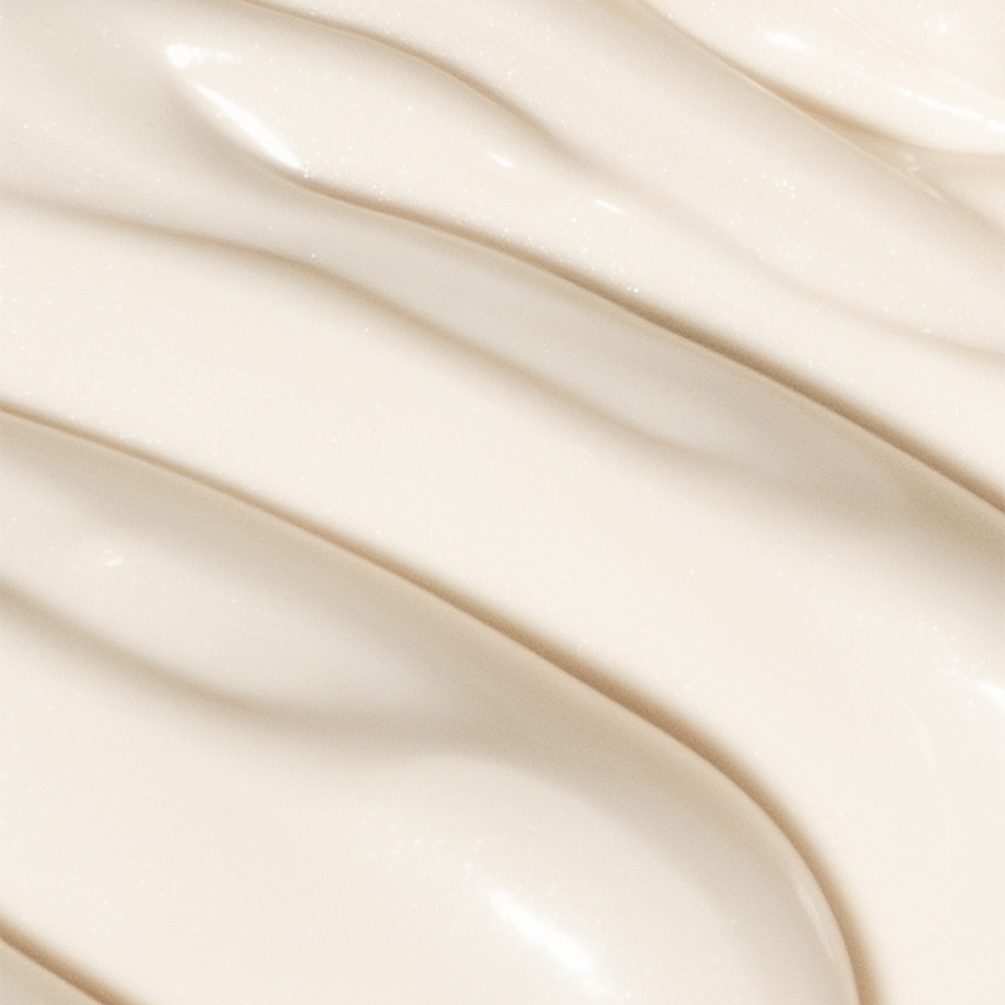 Coola Dew Good Illuminating Body Melt Lotion SPF30, a skincare serum with a smooth, hydrating texture and luminous finish.