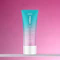 Coola Dew Good Illuminating Body Melt Lotion SPF30 in a sleek skincare serum bottle with a pump dispenser.