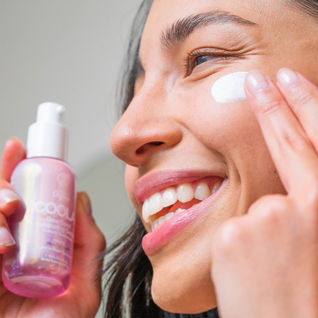Coola Dew Good Illuminating Face Serum SPF30 in a sleek bottle, moisturizing and brightening with sun protection from Coola Suncare.