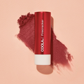 Coola Mineral Liplux Organic Tinted Lip Balm with SPF 30 in Firecracker shade, featuring natural ingredients and moisturizing texture.