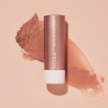 Coola Mineral Liplux Organic Tinted Lip Balm with SPF30 in Skinny Dip shade, showing the colorful tube and natural packaging.