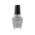 Cuccio Colour I Reflect nail polish bottle with vibrant, reflective purple shade in a sleek container.