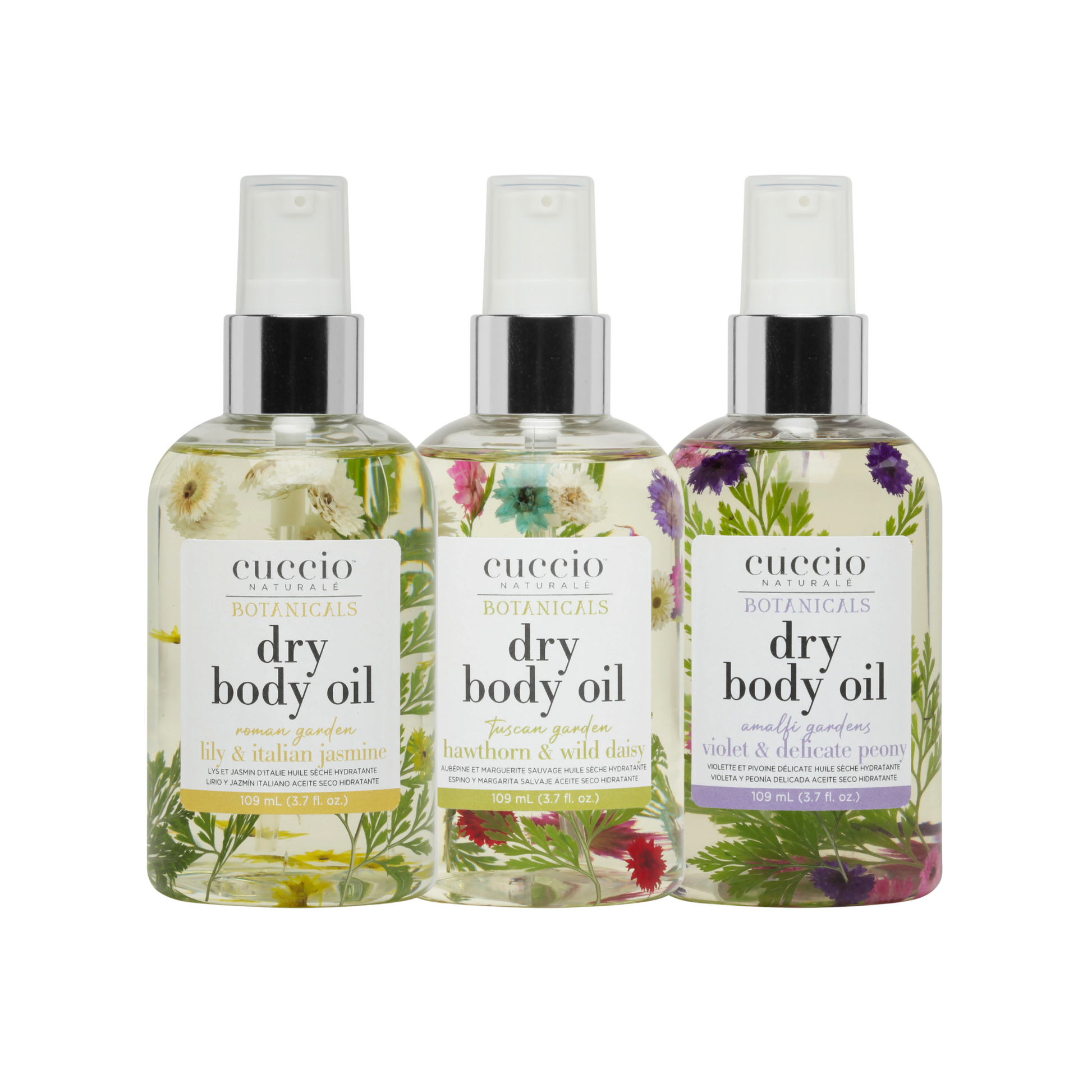 Cuccio Naturalé Botanicals Dry Body Oil set featuring multiple 109ml bottles with botanical-infused moisturizing body oils.