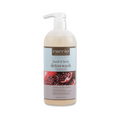 Cuccio Naturalé Pomegranate & Fig Body Wash showing a pump bottle with a colorful label and fresh pomegranate and fig illustrations.