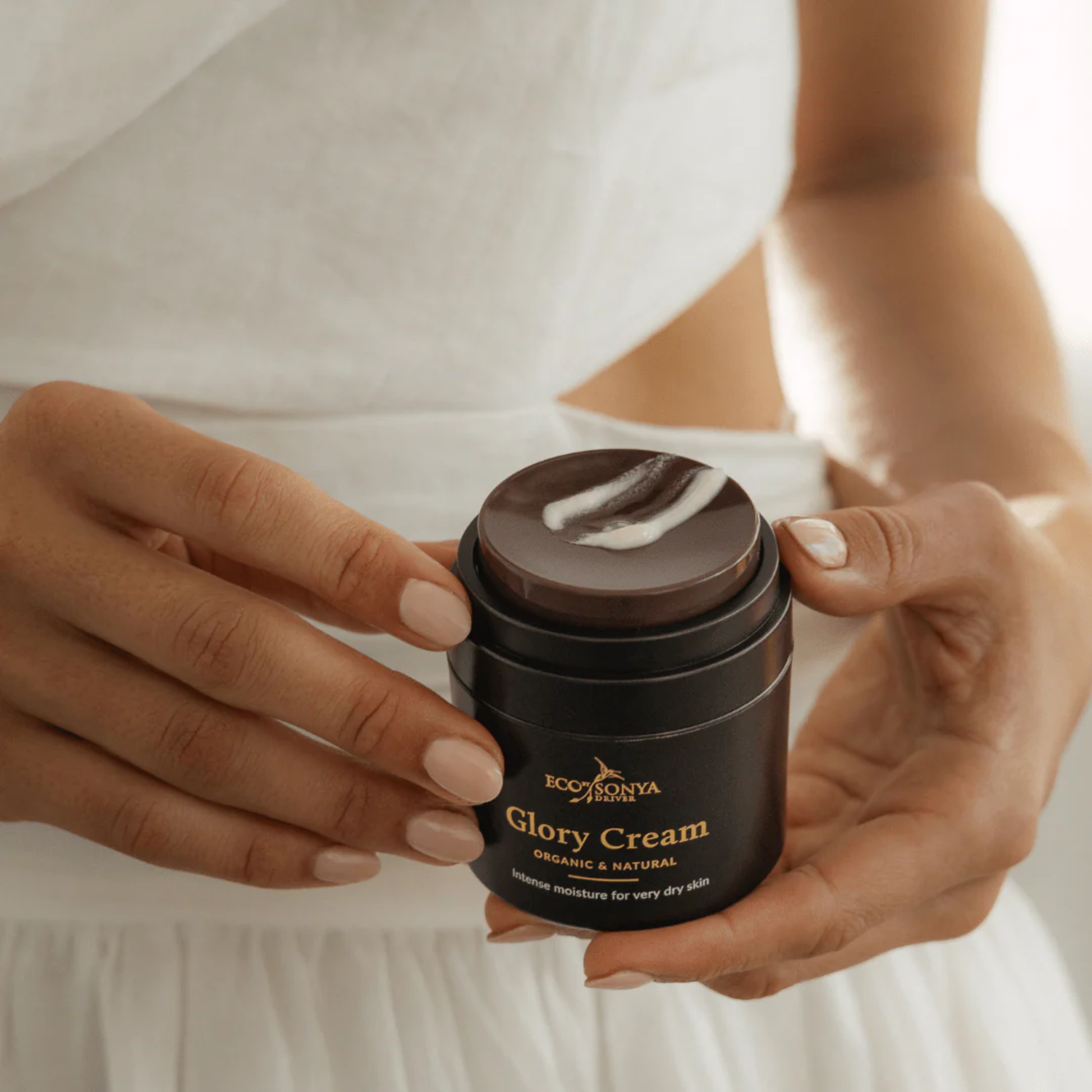 Eco by Sonya Driver Glory Cream skincare serum in a sleek jar, showcasing its luxurious texture and elegant packaging.