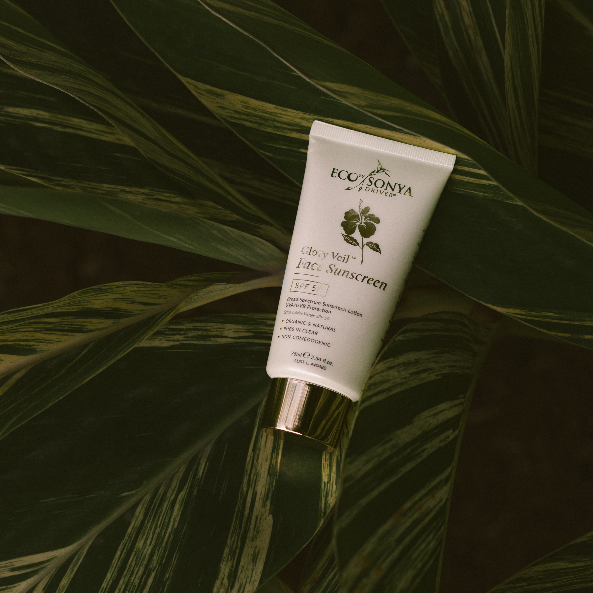 Eco by Sonya Driver Glory Veil SPF50 face sunscreen lotion in a white tube with a blue cap, ready to protect skin from UV rays.