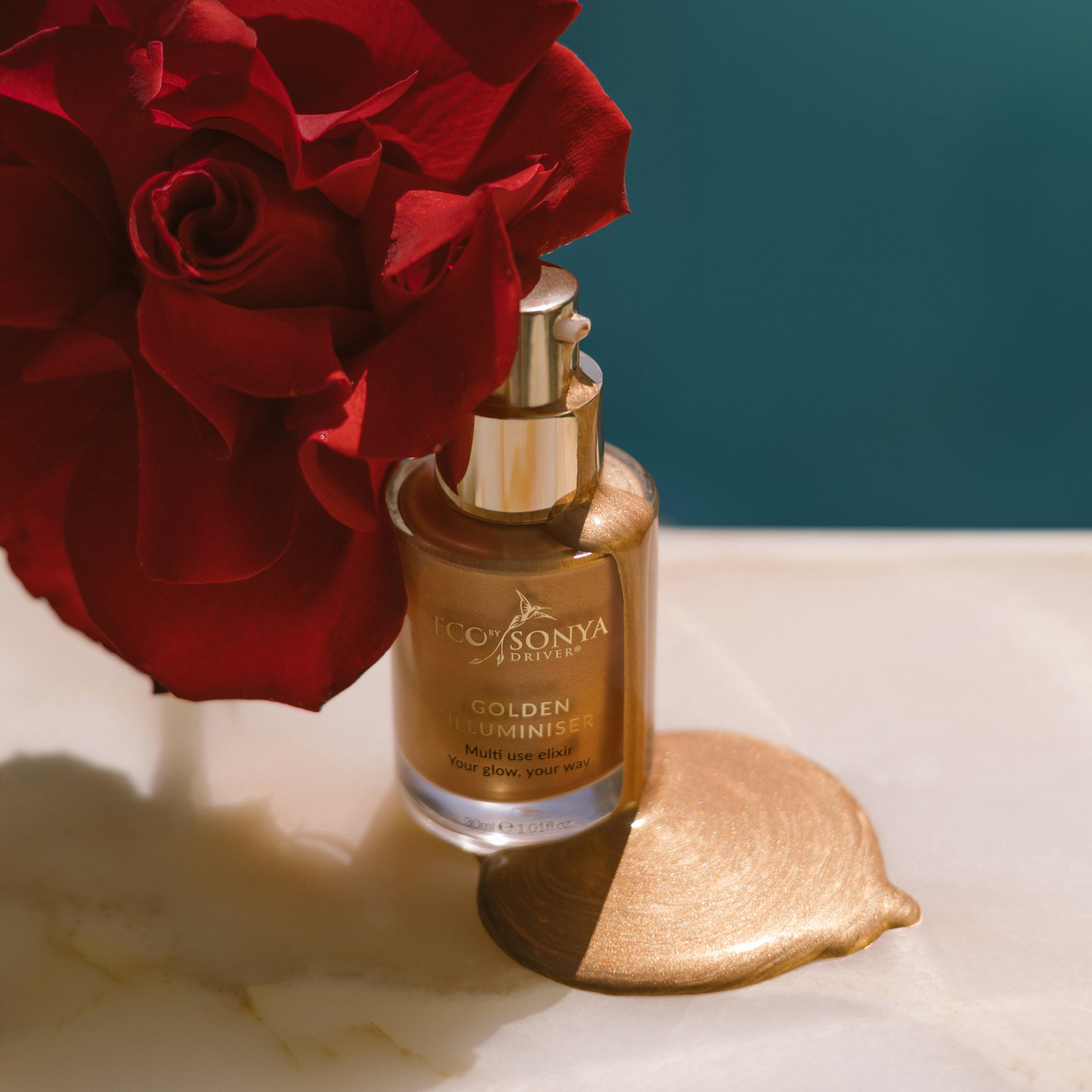 Eco by Sonya Driver Golden Illuminiser skincare serum in a dropper bottle with a golden glow and radiant finish.