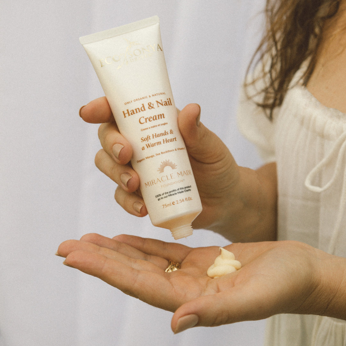 Eco by Sonya Driver Hand and Nail Cream in a sleek tube, designed to moisturize and nourish hands and nails.