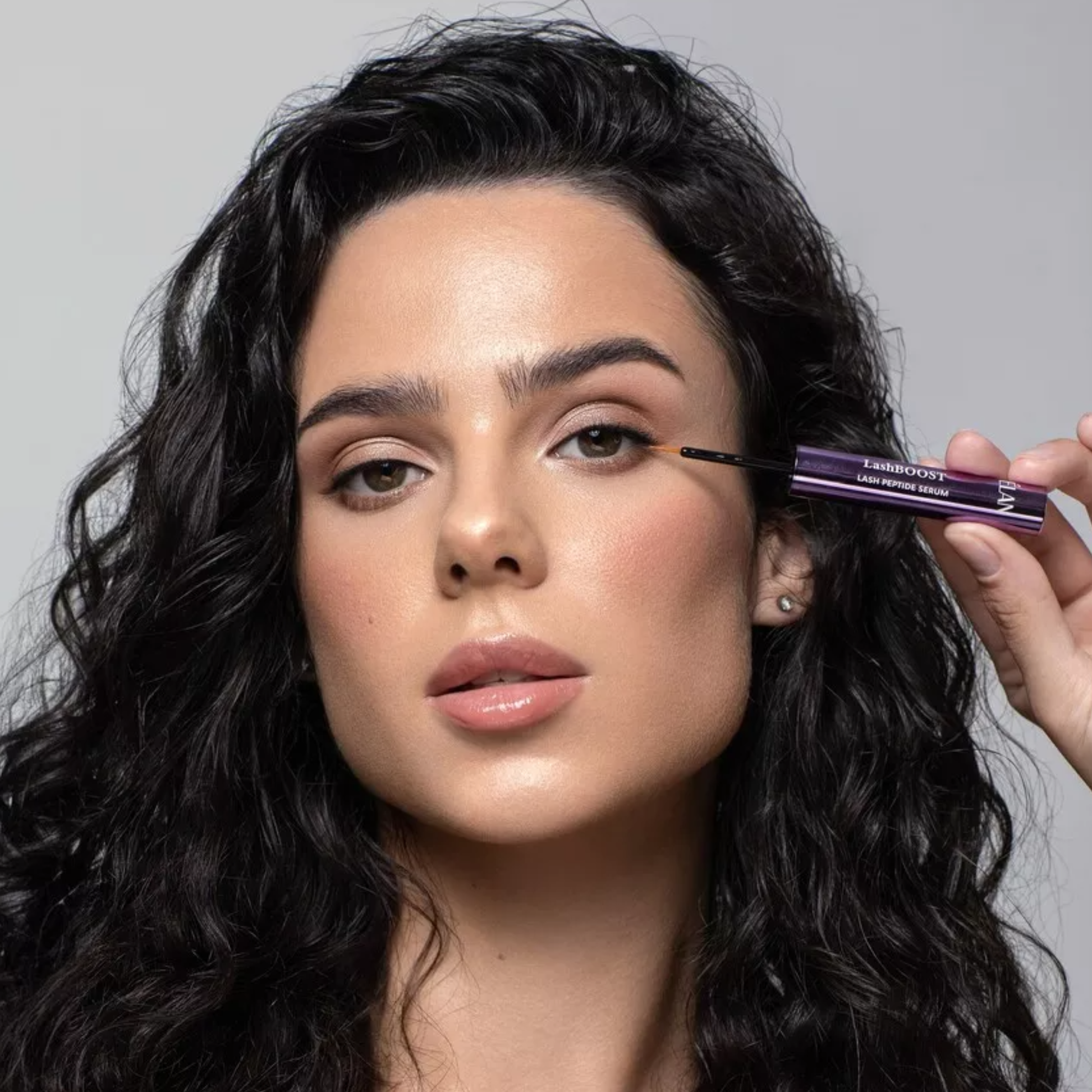 Élan LashBOOST peptide lash care serum bottle for enhancing and nourishing eyelashes and brows, 4.5ml.