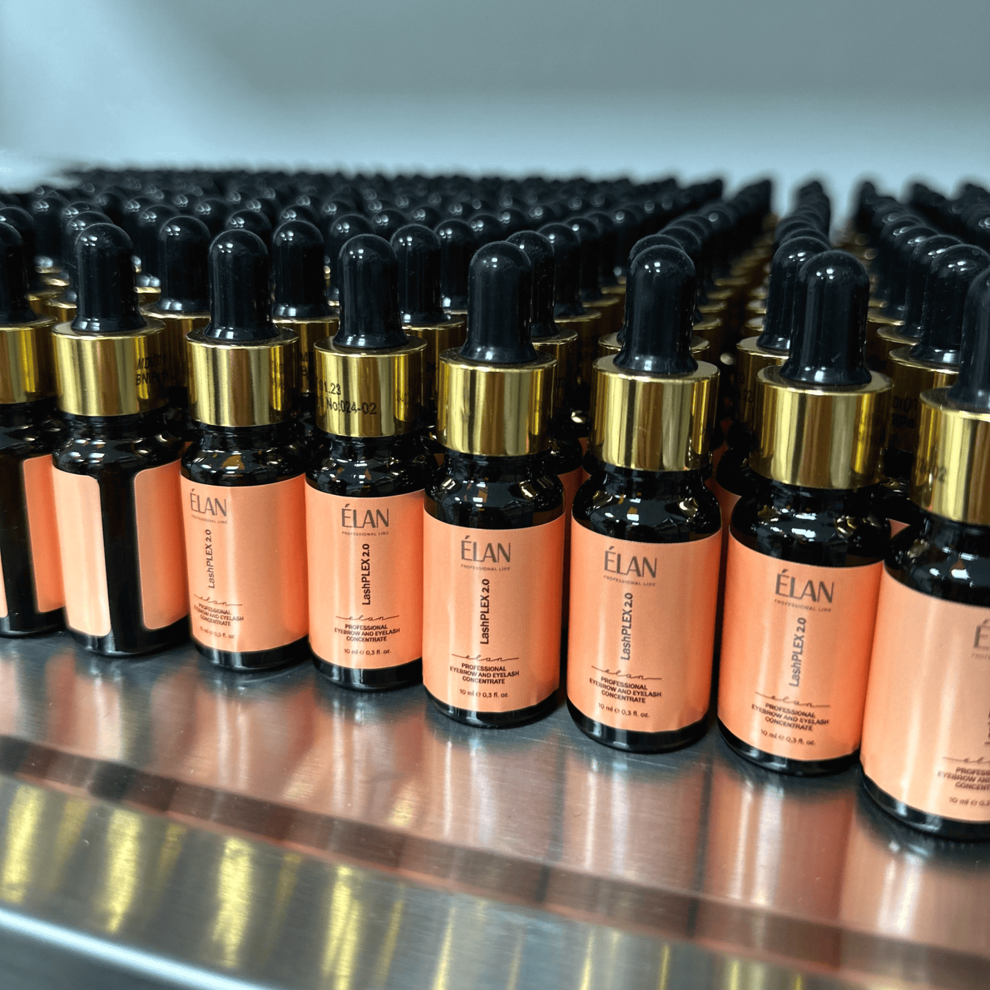 Élan LashPlex Eyelash Concentrate 2.0 in a sleek container, designed for lash and brow aftercare by Élan Cosmetics.