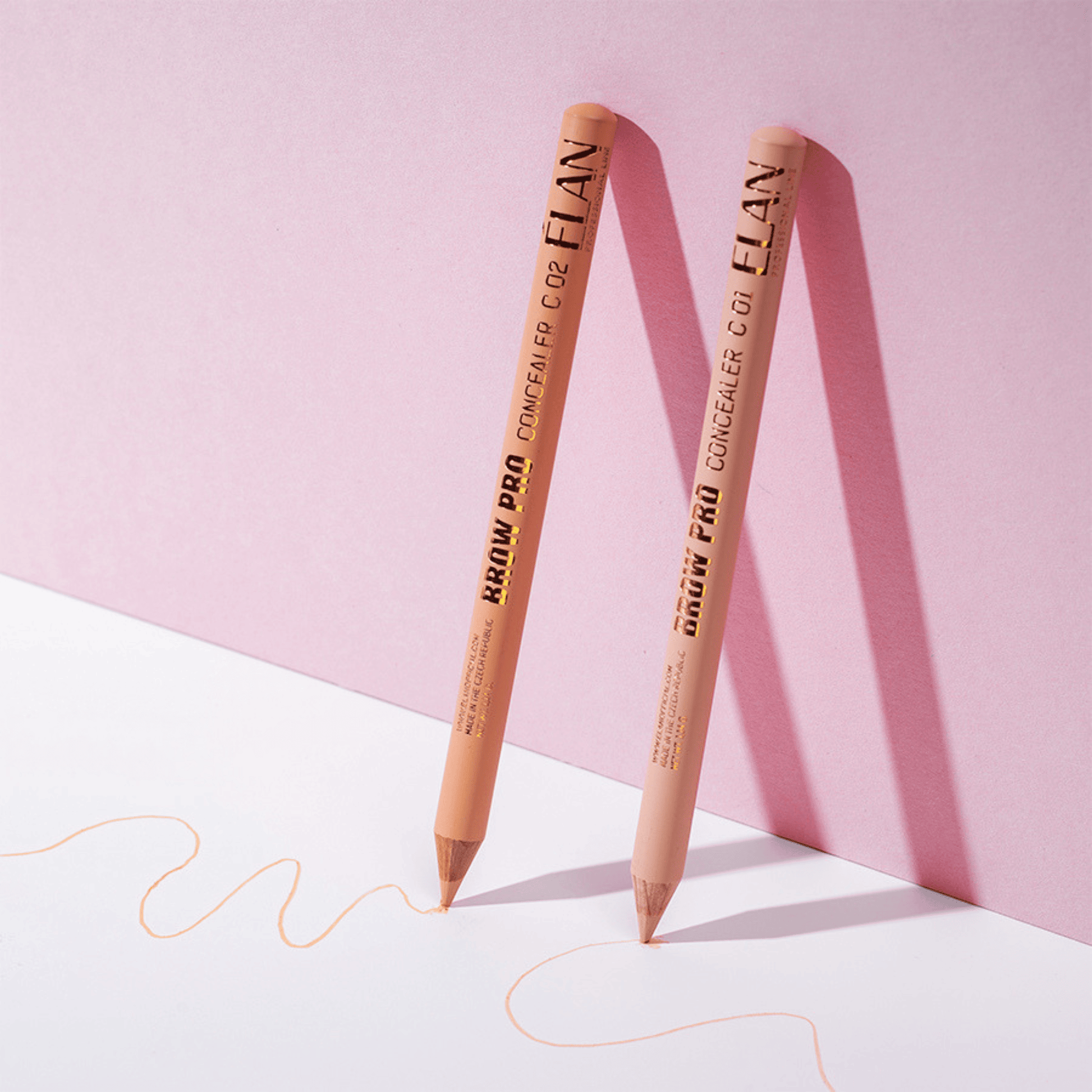Élan Multipurpose Concealer Pencil C02 in Warm Nude, used for correcting and highlighting eyebrows and lashes.