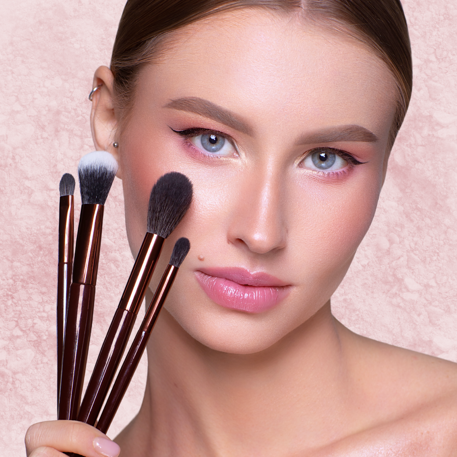 Élan Professional Makeup Brush Face #36 from Élan Cosmetics, a precise tool for applying face makeup, shown in a lifestyle setting.