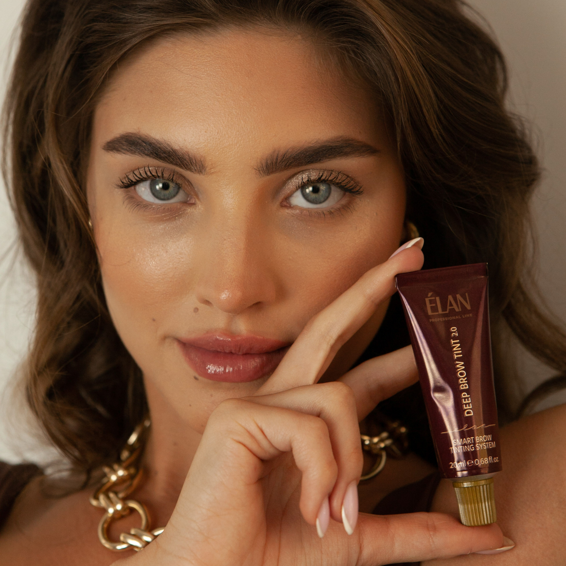 Élan Cosmetics Élan Smart Brow Tinting System Deep Brow Tint 2.0 in Icy Cold Brown, tube for long-lasting eyebrow color.