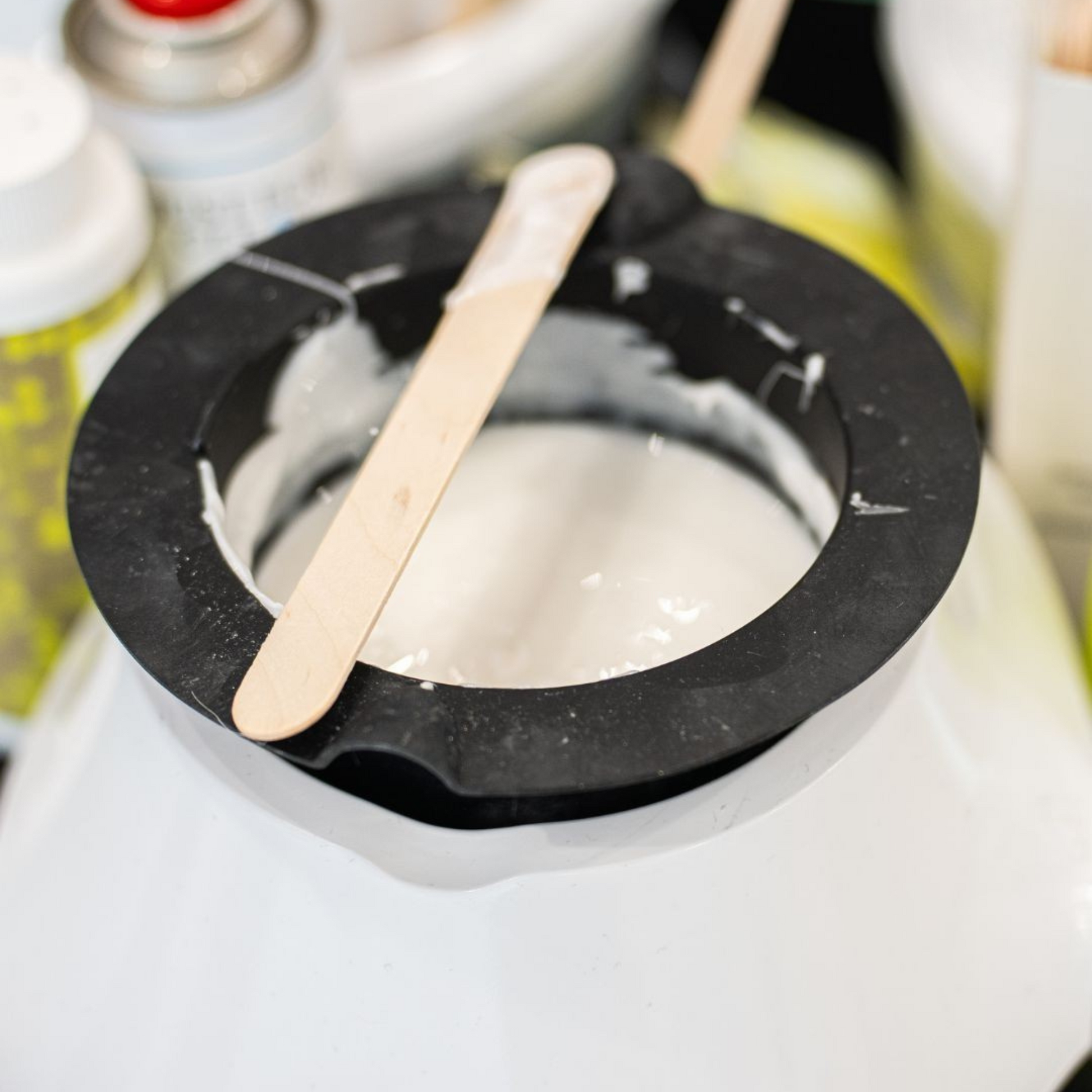 Silicon pot for SKIN'S wax heater, designed for melting wax in a wax warmer, with a flexible silicone container and heating element.