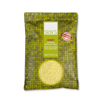 Skin's Honey Supreme Wax for Brazilian waxing, showcasing smooth, golden wax in a professional salon setting.