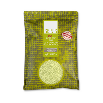 Close-up of SKIN'S Skin's Soft Super Grip Wax jar showing the wax's smooth texture and branding on the label.