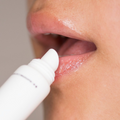 SummeCosmetics ECC Lip Balm in sleek tube, moisturizing lotion with natural ingredients for soft, hydrated lips.