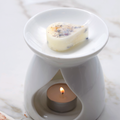 White Yumi Beauty ceramic fragrance burner for candles, featuring a smooth, modern design perfect for home decor and aromatherapy.