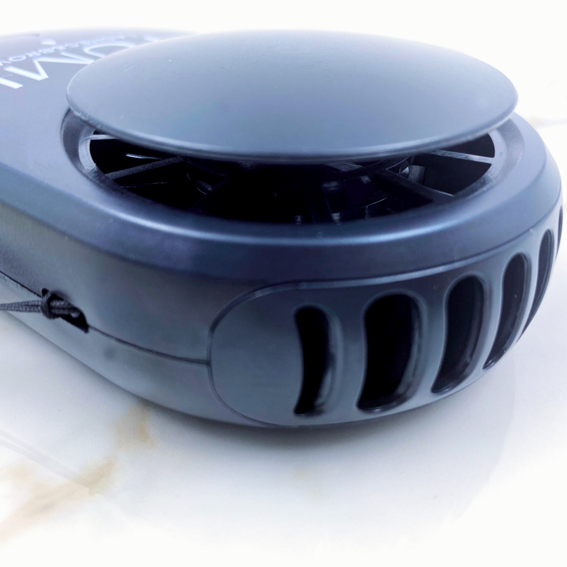 Yumi Lashes & Brows mini USB fan with sleek design, ideal for cooling and drying lash and brow treatments.