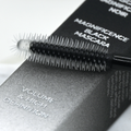 Yumi Beauty Yumi Lashes Magnificence Black Mascara display with multiple mascara tubes showing sleek black packaging